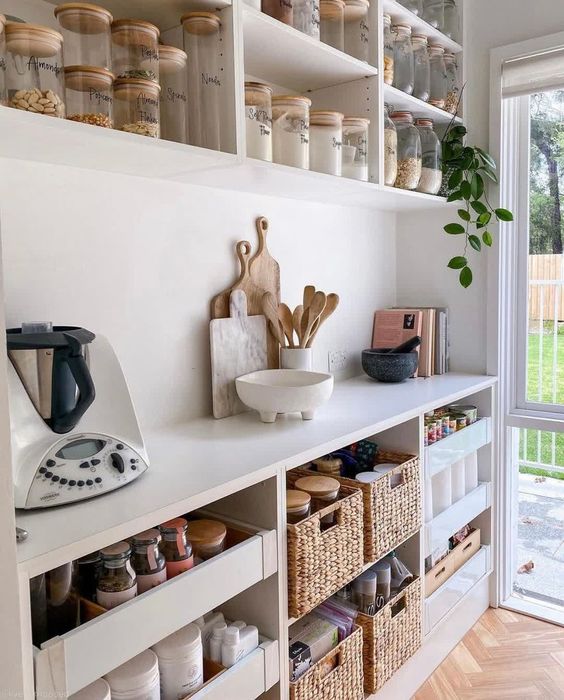 Compact organized kitchen with smart shelves for efficient storage solutions.